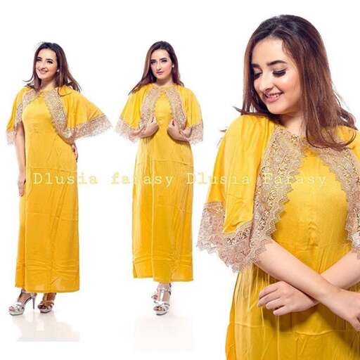 actor in a yellow dress