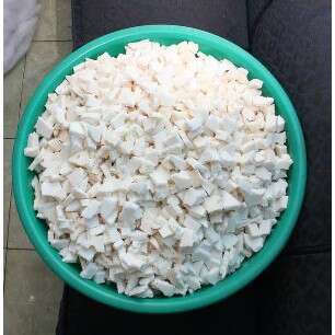 a bowl of rice on a person's lap.