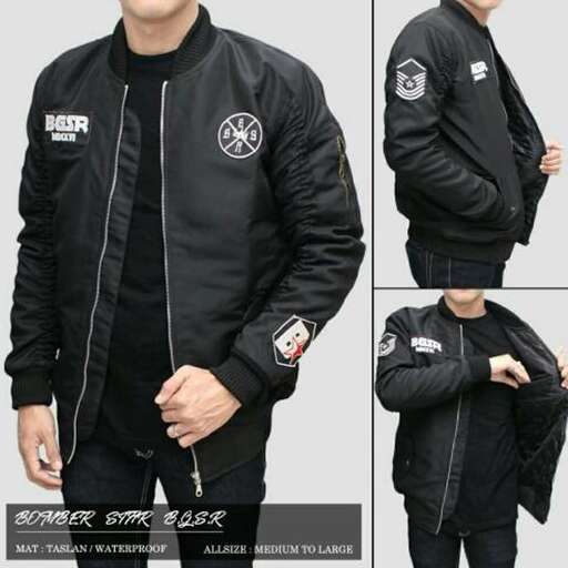 a black jacket with a hoodie and a pocket.