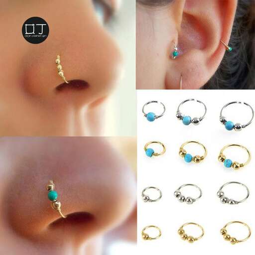 a pair of earrings with a blue sapphire and green sapphire.