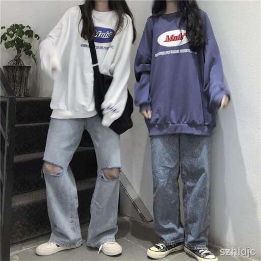 a couple of girls standing next to each other.