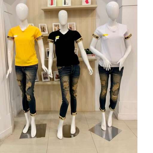 a store with a window display of mannequins.