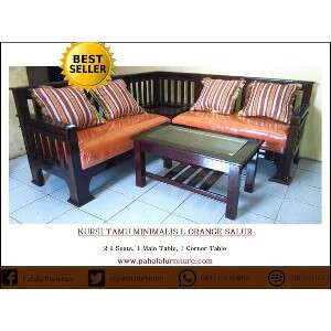 a pair of leather chairs with a wooden bench.