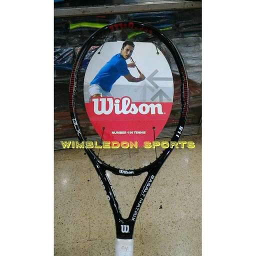 a tennis racket is on the floor of a store.