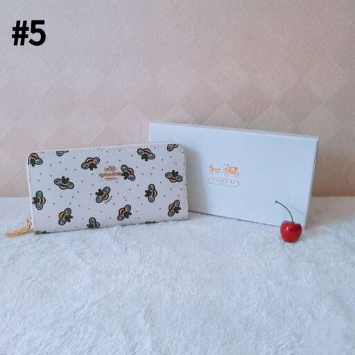 a box with a small apple on it and a small apple in the corner.