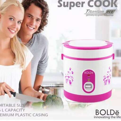 a pink and white ice cream can be used as a cooking pot.