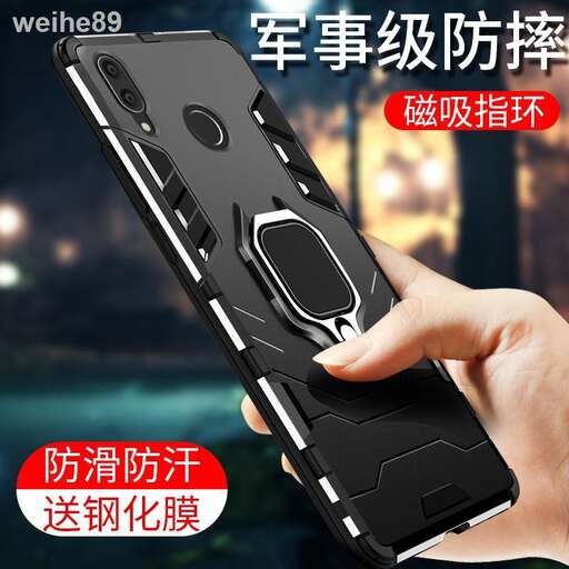 a person holding a cell phone in their hand.