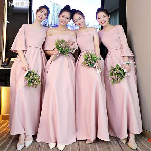 the bridesmaids in pink dresses