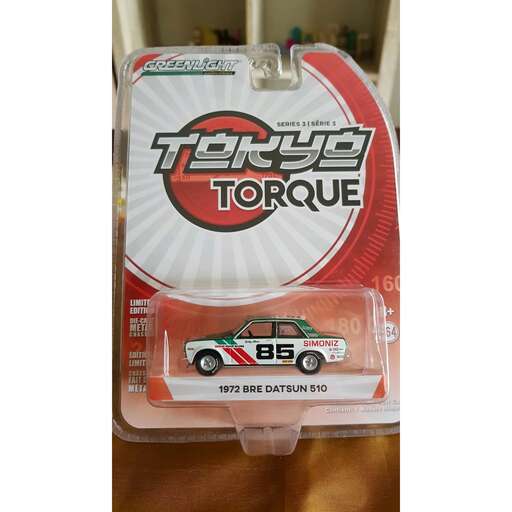 a car key chain in a plastic bag.