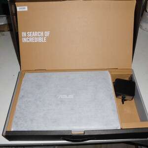 the box is in a box with a box of toilet paper.