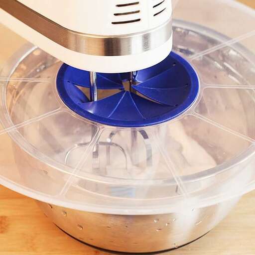 a blue plastic food processor with a blue base.