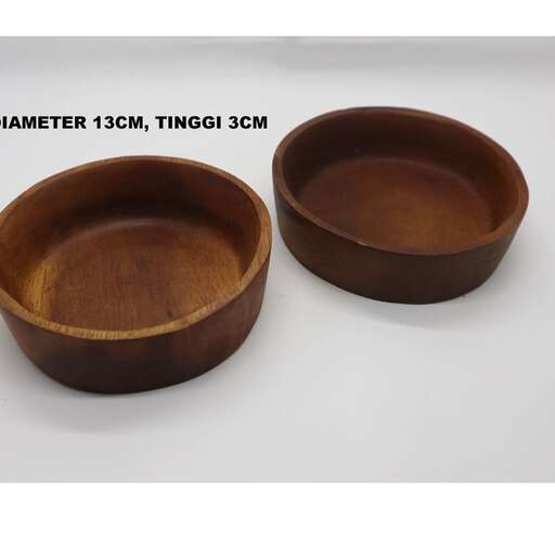 a pair of wooden bowls with a lid.