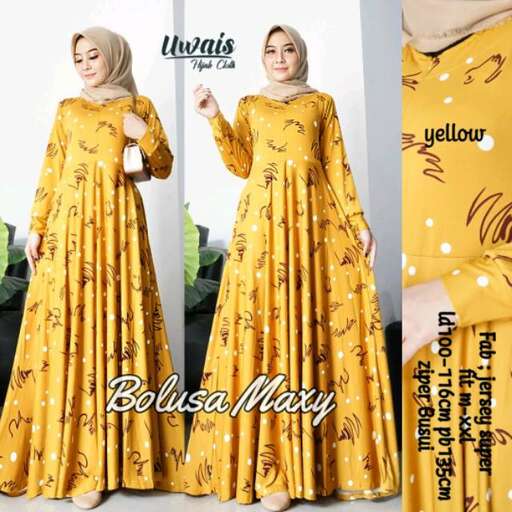 yellow long sleeved dress with a pattern