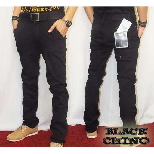 a pair of black jeans with a white tag.