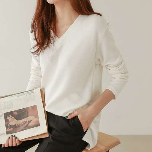 a white blouse with a black skirt