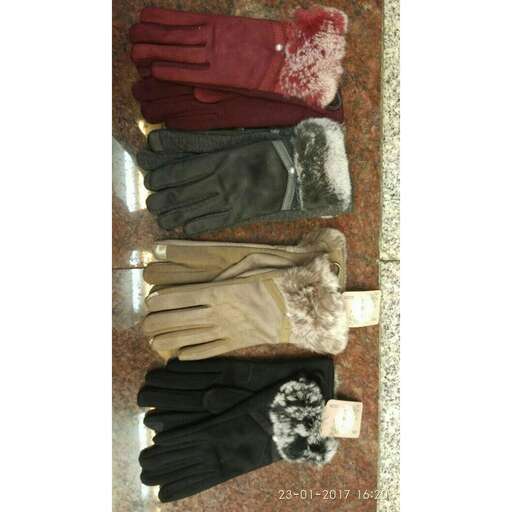 a small shelf of clothes for sale in the market