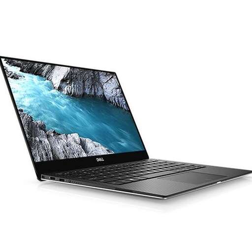 a laptop computer with a picture of a blue ocean.