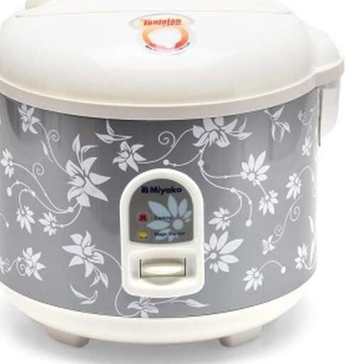 a small crock pot with a lid on it.
