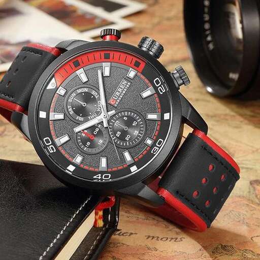 watch with a red strap