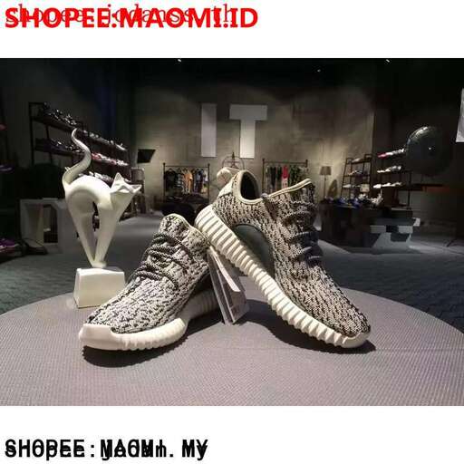 a pair of shoes on display in a store.