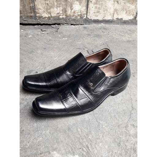 a pair of black leather shoes