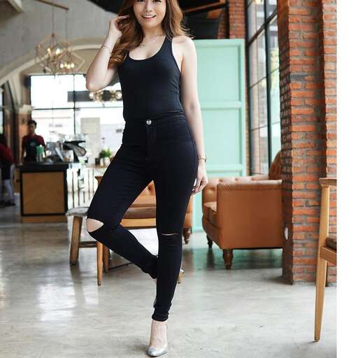 person in a black jumpsuit