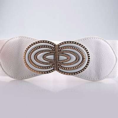 a white bow with brown and brown designs.