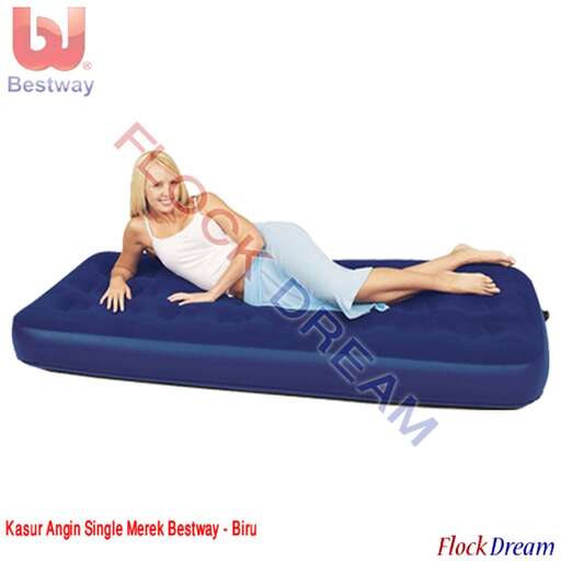 person is a long - haired girl in a white tank top and blue pants.