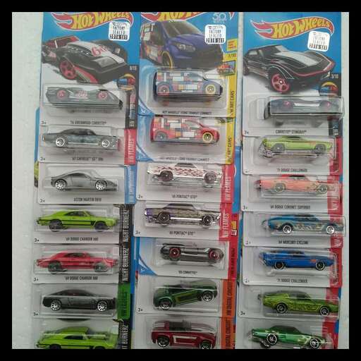 a collection of cars in a row