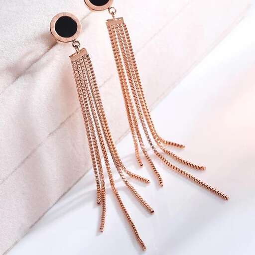 a pair of earrings with a black glass beaded top.