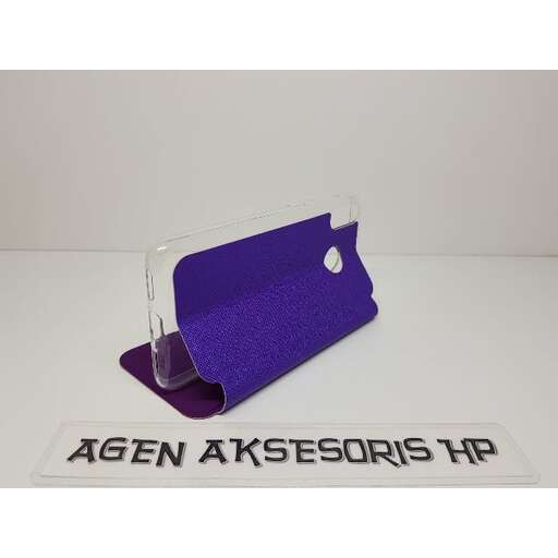 a purple bag with a label on it.