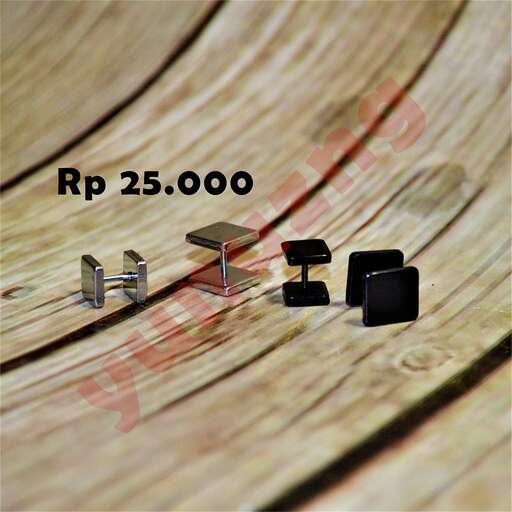 a wooden clock with a number of keys and a screwdriver.