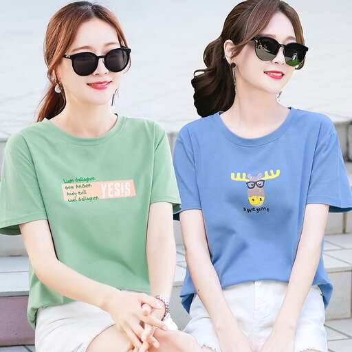 women in green t - shirts and white shorts