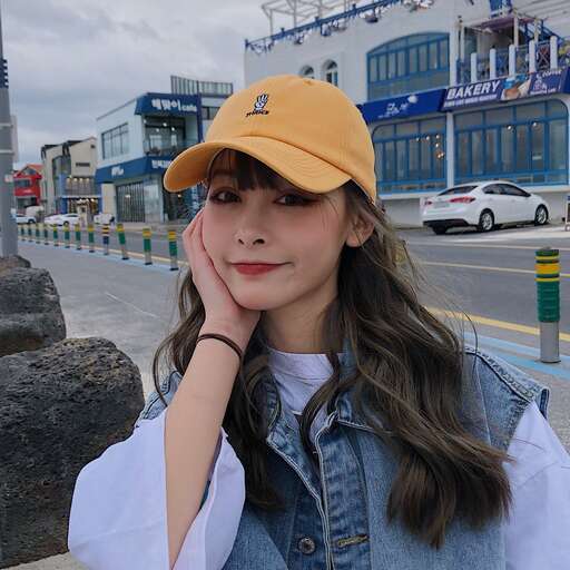 person, a girl who is wearing a hat