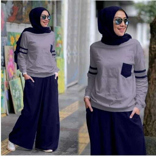 a long sleeved shirt with a long sleeved shirt and a long skirt.