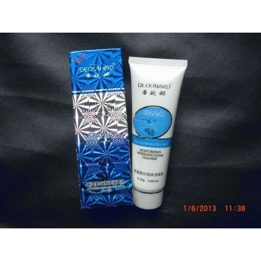 a blue and white tube of lotion.