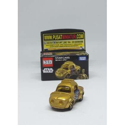 a toy car and a toy car in a box