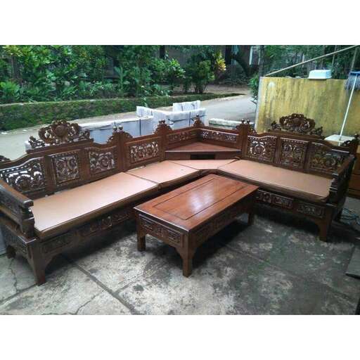 a pair of chairs with a table and chairs.