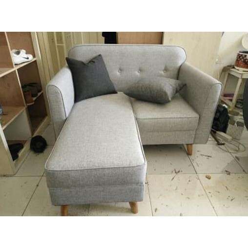 a chair that is sitting in a room.