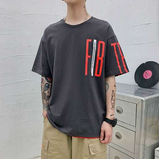 a man with a tattoo on his arm