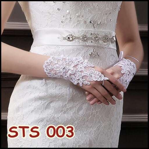 a close up of the hands of a bride