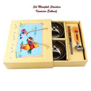 a box with a picture of a woman holding a spoon and a spoon.
