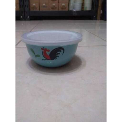 a bowl on the floor of a store.