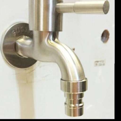 a close up of a pipe and a sink
