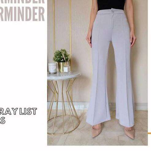 a fashion look featuring high waisted pants.