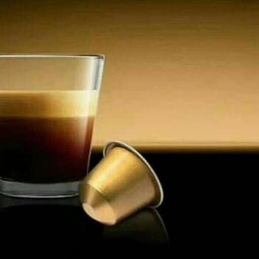 coffee with a spoon in it.