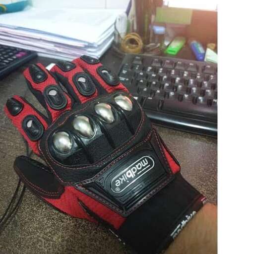 a glove with a pair of gloves on it.