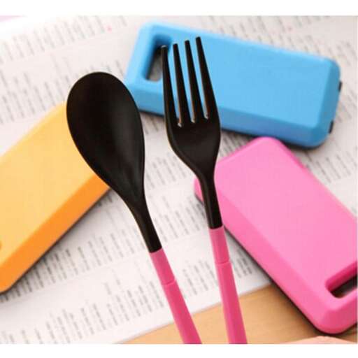 a pink and blue plastic fork and a pink cell phone.