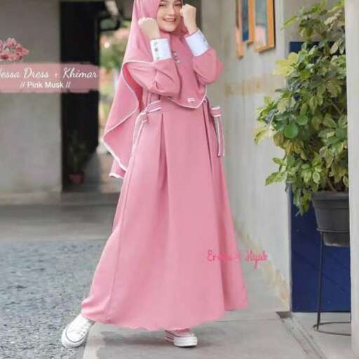 a girl in a pink dress