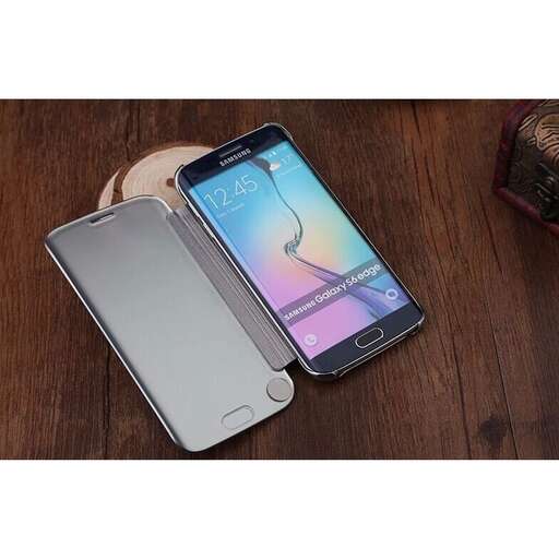 a cell phone sitting next to a cell phone.